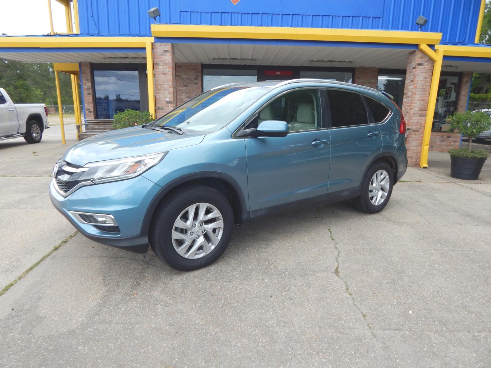 2015 Teal /Tan Honda CR-V (2HKRM3H53FH) with an 2.4L 4 cyl. engine, Automatic transmission, located at 3120 W Tennessee St, Tallahassee, FL, 32304-1002, (850) 575-6702, 30.458841, -84.349648 - Used Car Supermarket is proud to present you with this loaded immaculate 2015 Honda CRV EX with sunroof and low miles. Used Car Supermarket prides itself in offering you the finest pre-owned vehicle in Tallahassee. Used Car Supermarket has been locally family owned and operated for over 48 years. Ou - Photo #0